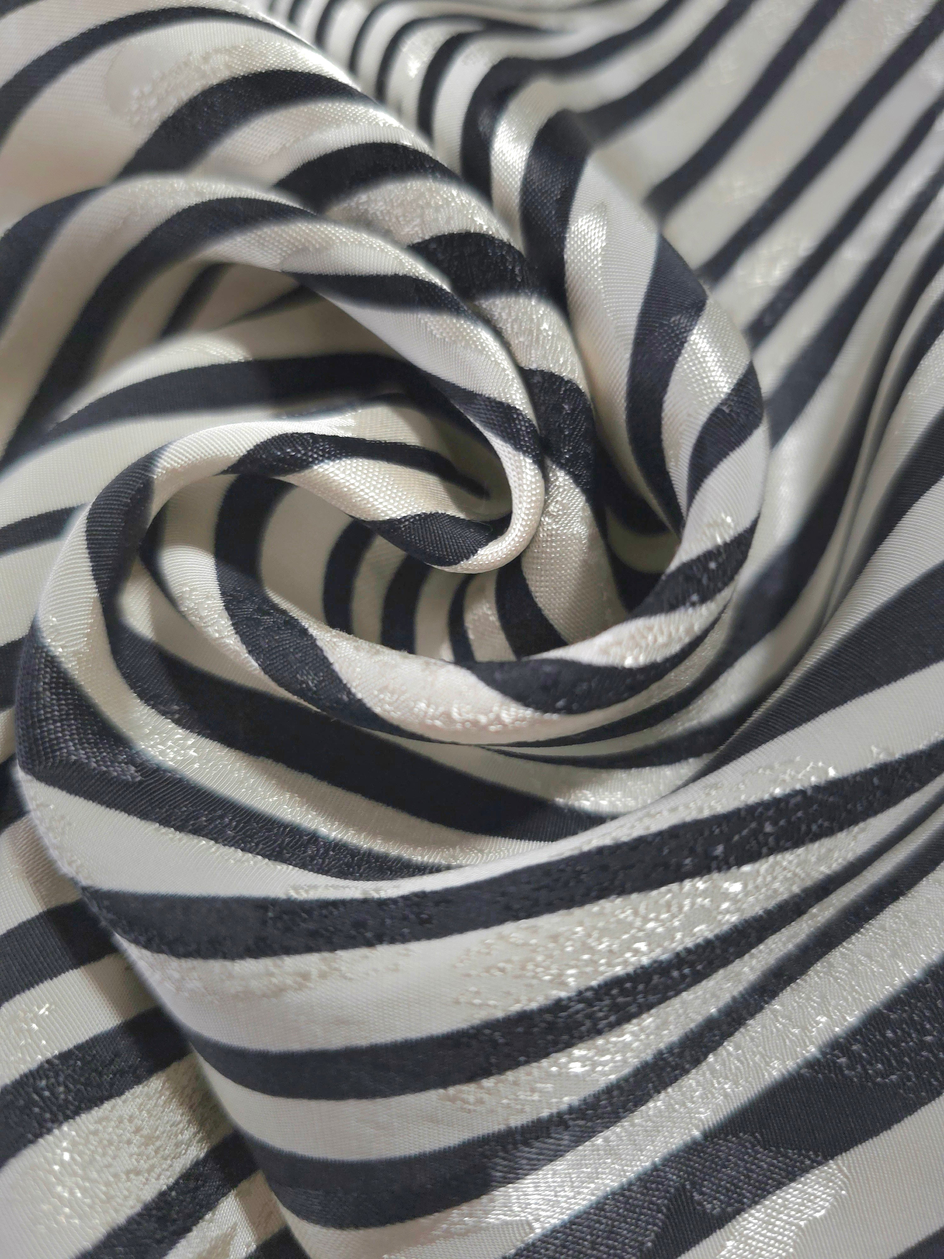 Close-up of draped Zebra printed jacquard fabric showing fold detail