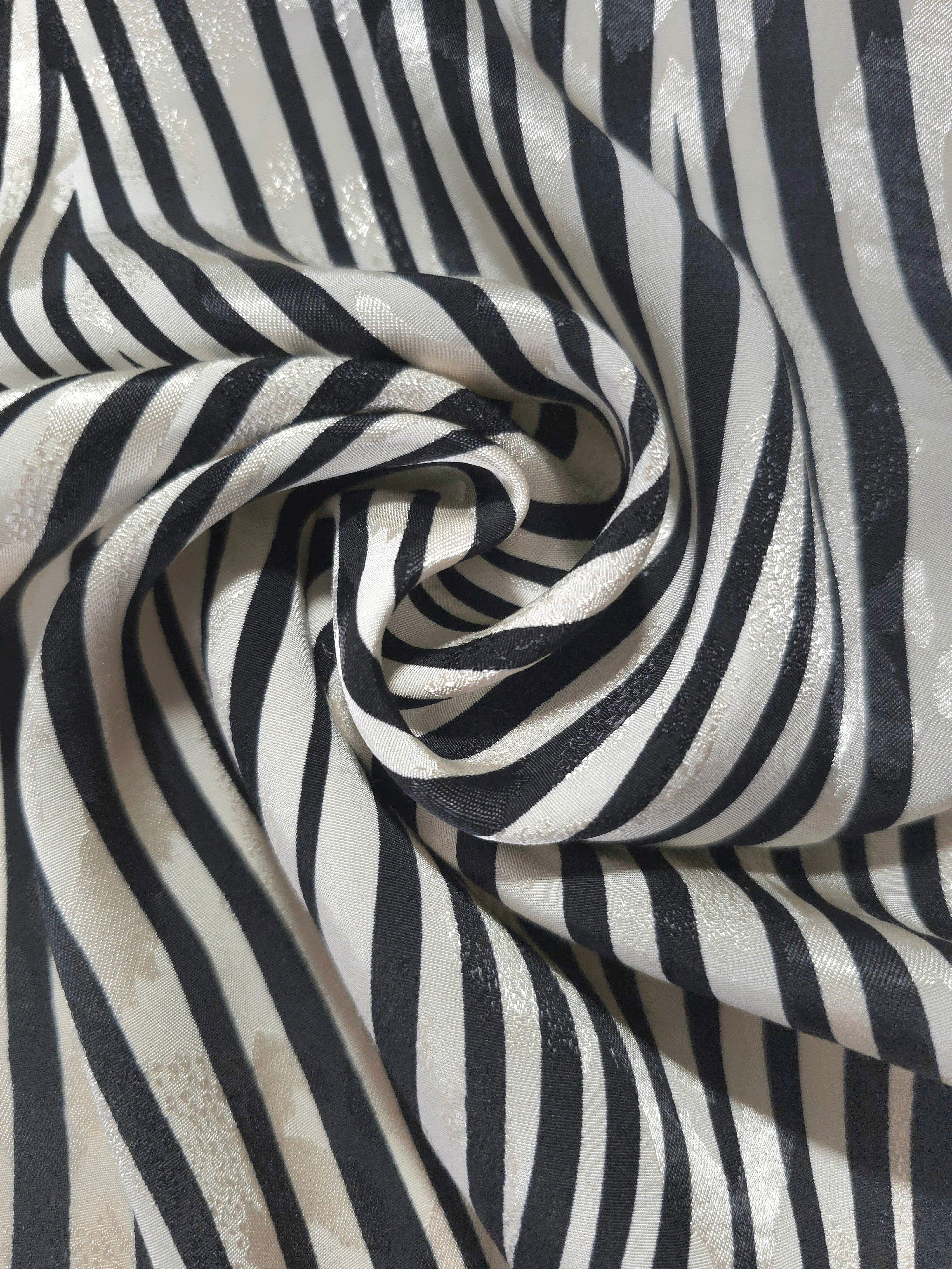 Zebra rotary print on Turkish jacquard fabric, draped showing fluid movement