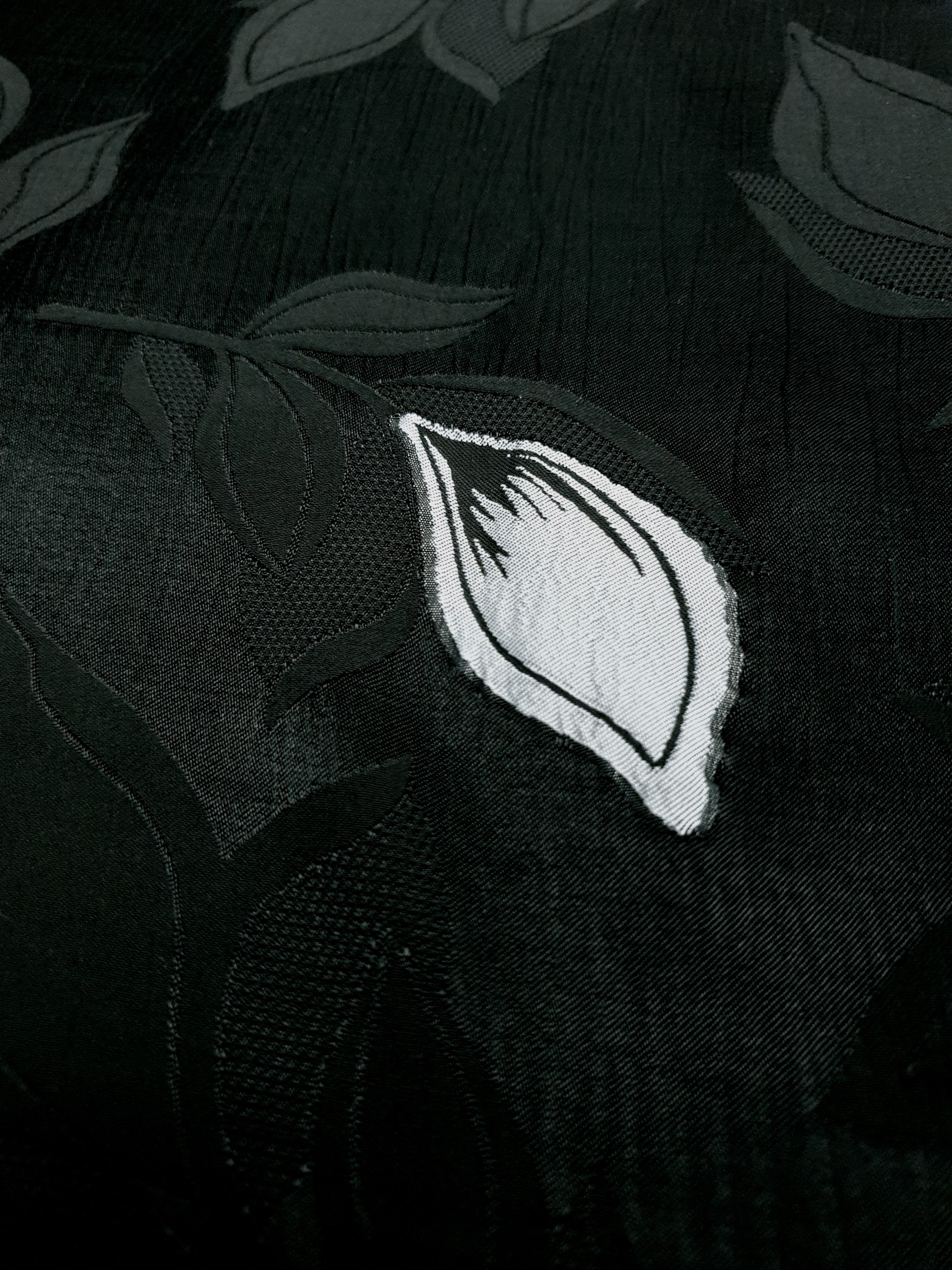 Viscose embossed two tone jacquard fabric close up texture