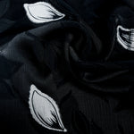 Draped viscose embossed two-tone jacquard design for dresses and skirts.
