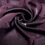 Drape view of viscose embossed two-tone jacquard with raised pattern.