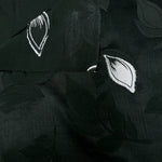 Front and back view of viscose embossed two-tone jacquard fabric.