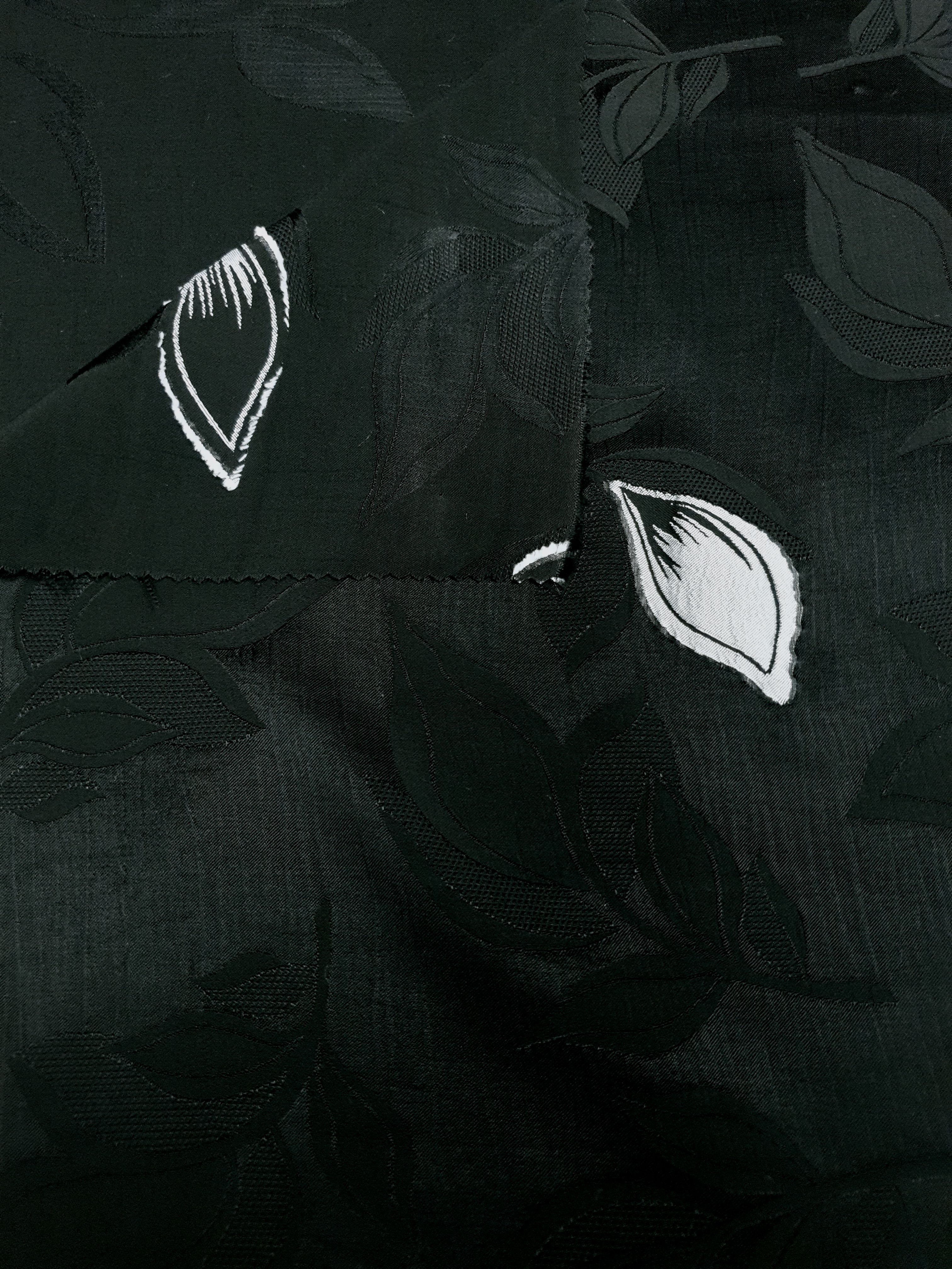Front and back view of viscose embossed two-tone jacquard fabric.