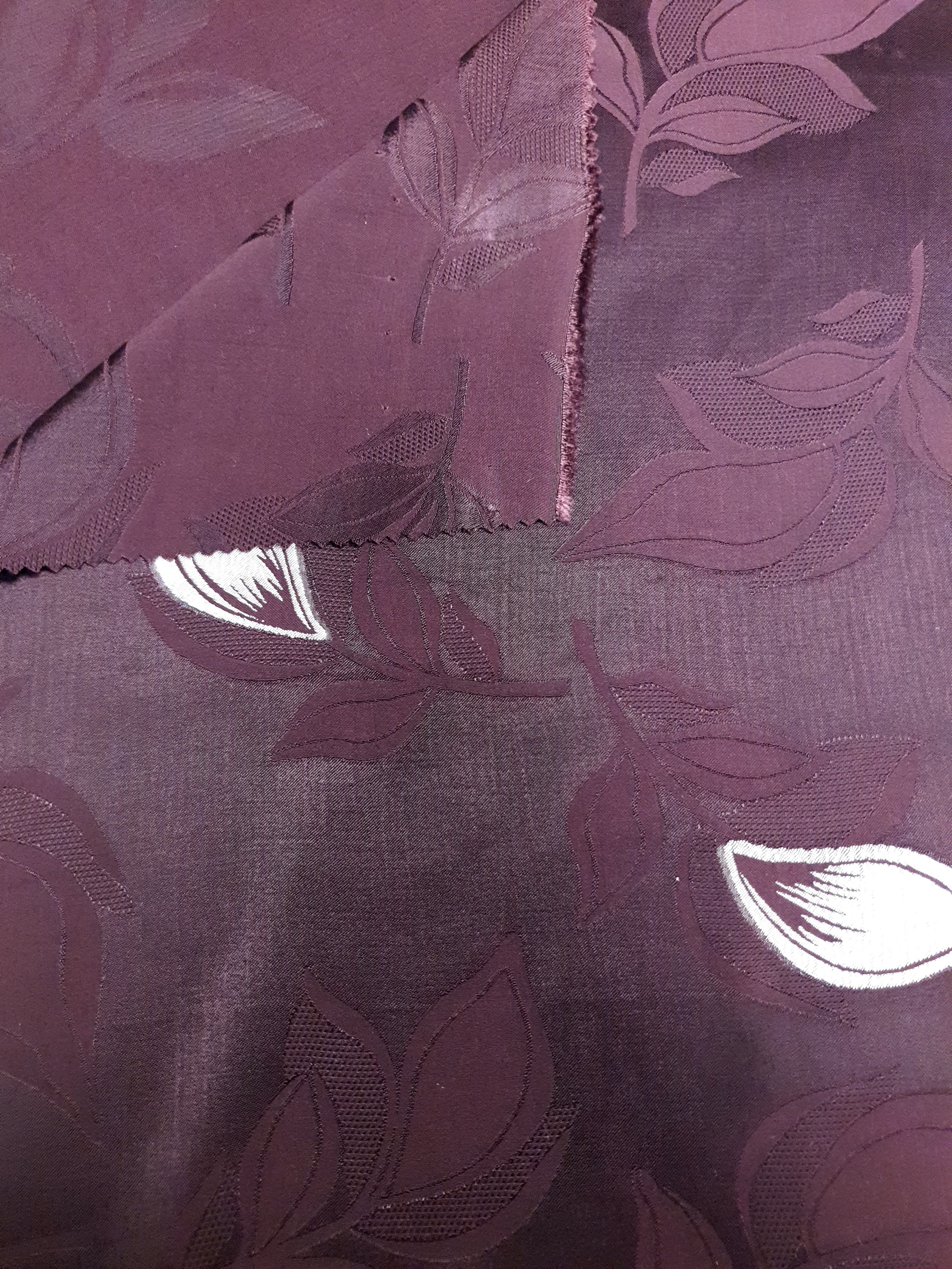 Front and back detail of two-tone jacquard fabric for coverage checks.