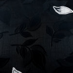 Wide shot of viscose embossed two-tone jacquard fabric by the meter.