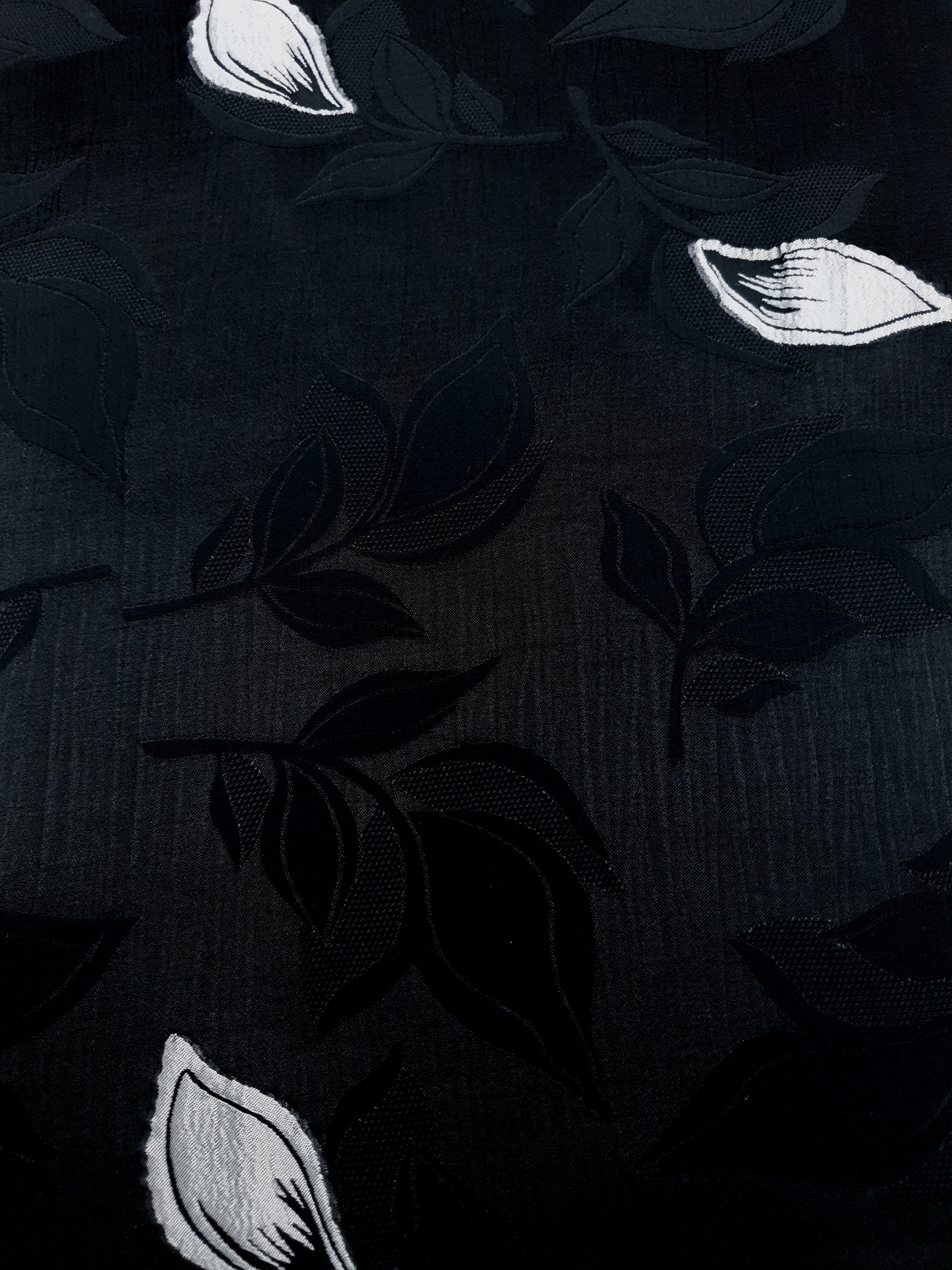 Wide shot of viscose embossed two-tone jacquard fabric by the meter.