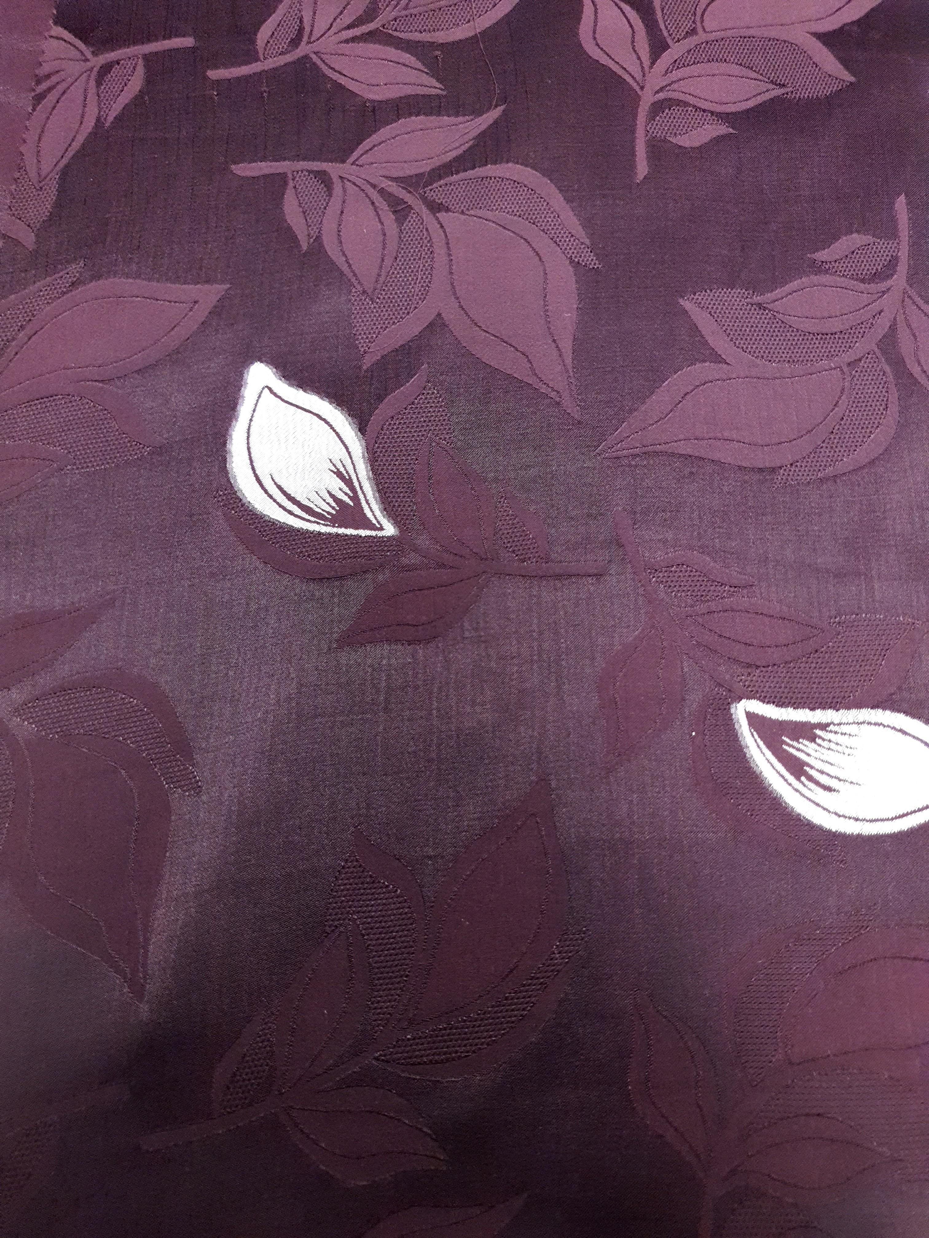 Wide view of viscose embossed two-tone jacquard for dress panels.