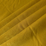 Wholesale Mustard Yellow silky polyamide garment fabric