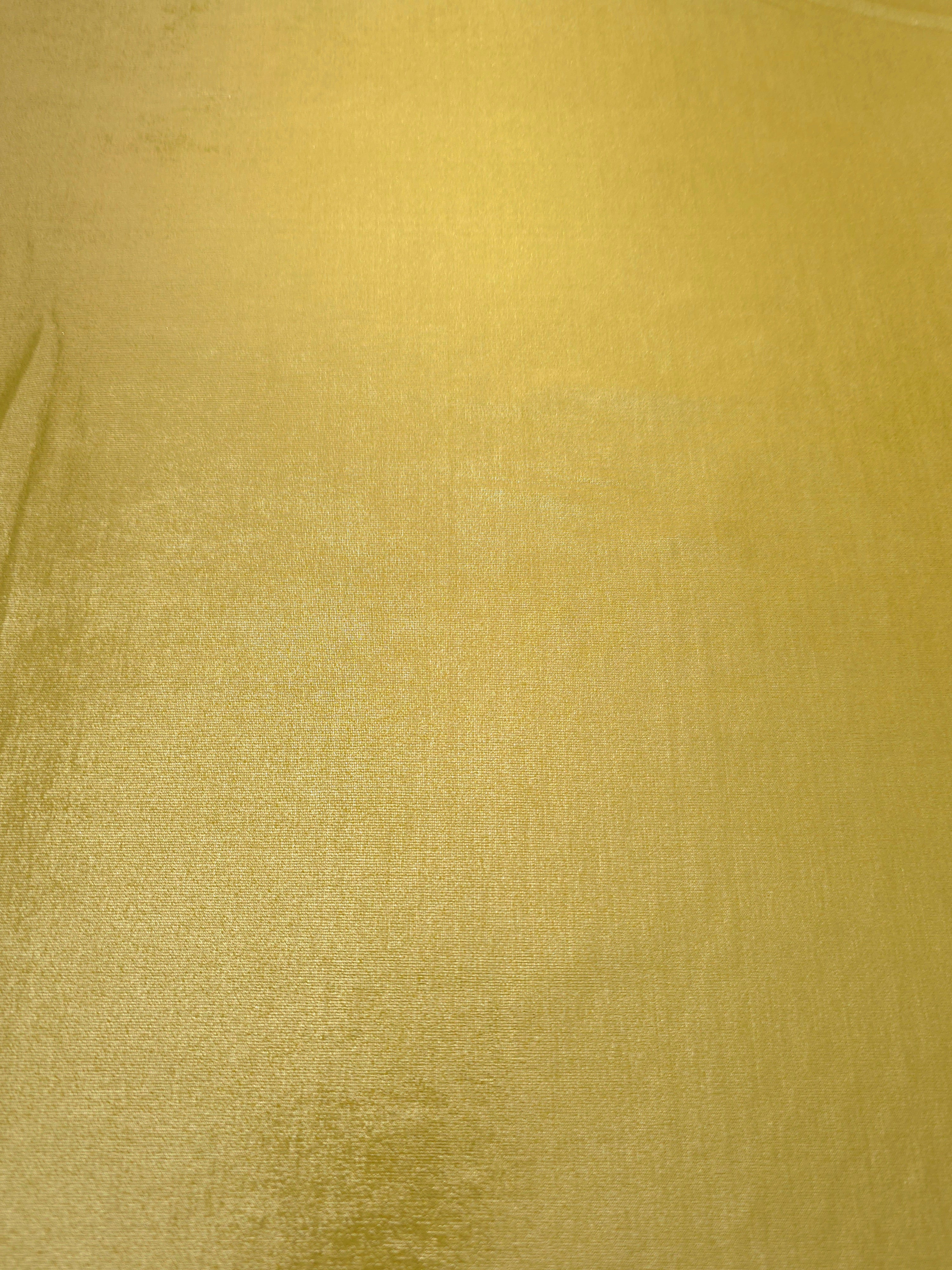 Flat view of Antique Gold shimmer stretch fabric showing its metallic foil surface for costumes, partywear and fashion apparel