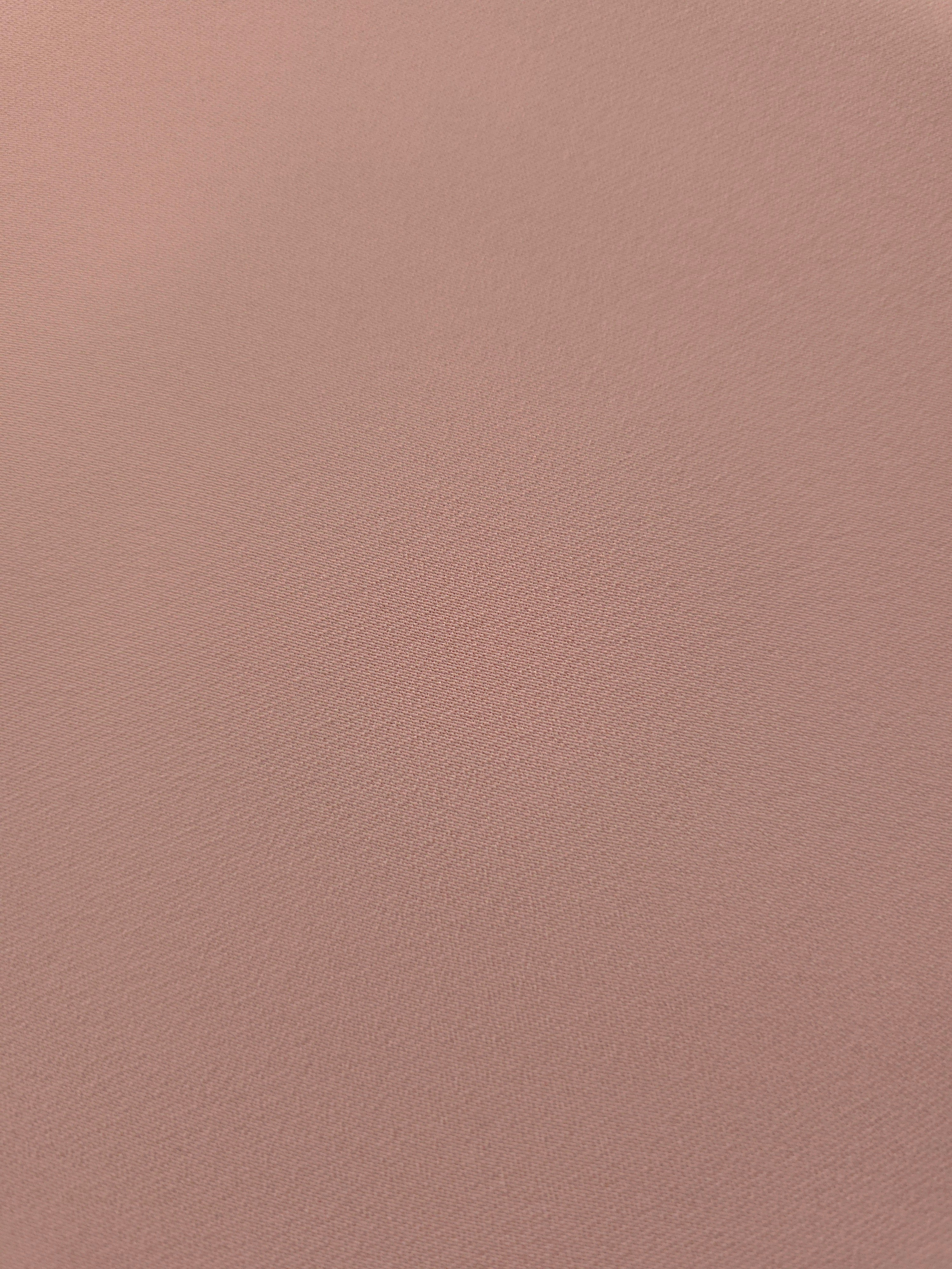Woven close-up of Antique Rose Beige mechanical polyester crepe showing smooth texture and a soft silky-feel finish