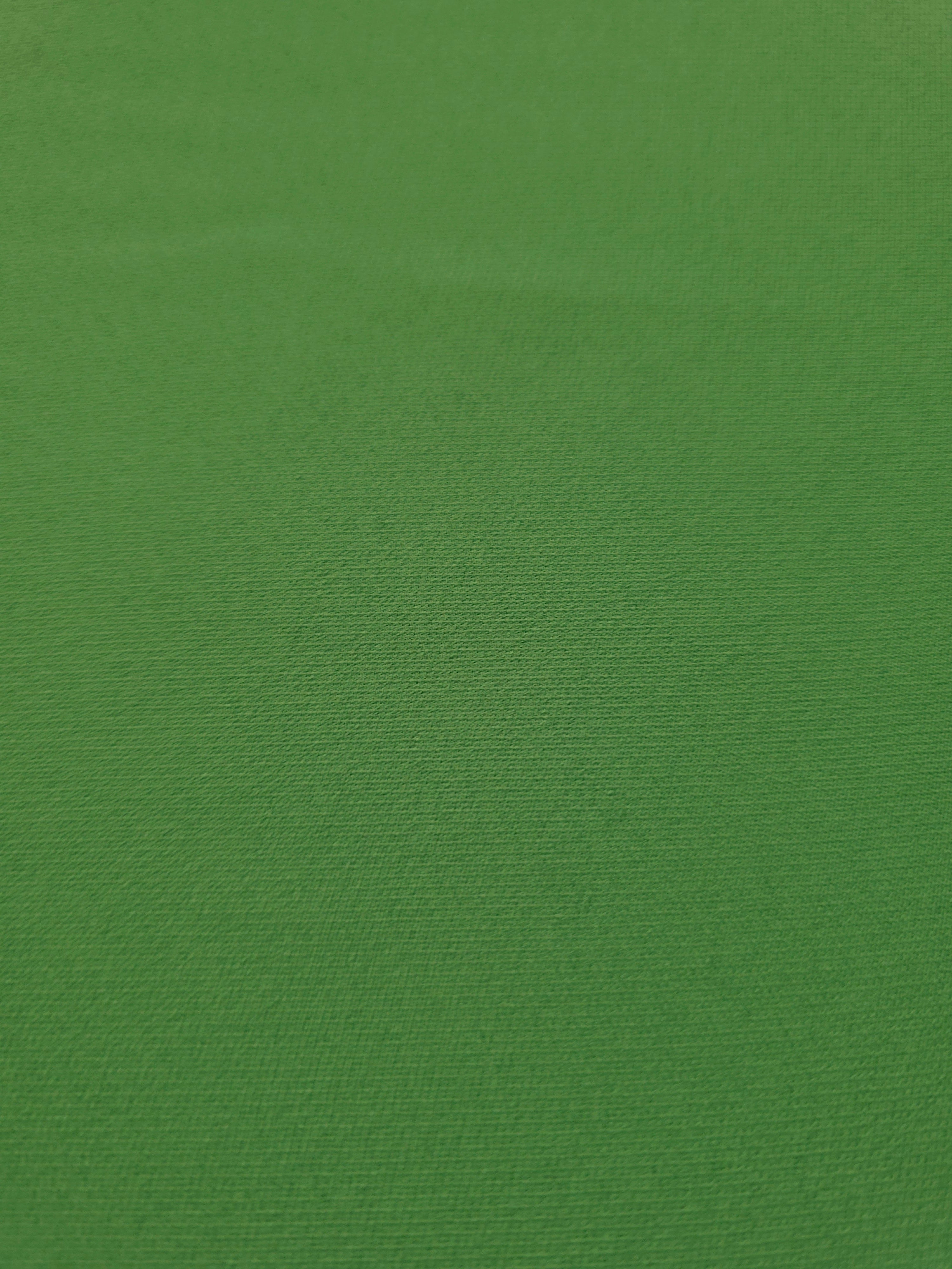 Texture detail of Avocado Green mechanical polyester crepe, showing a fine weave and silky-soft surface