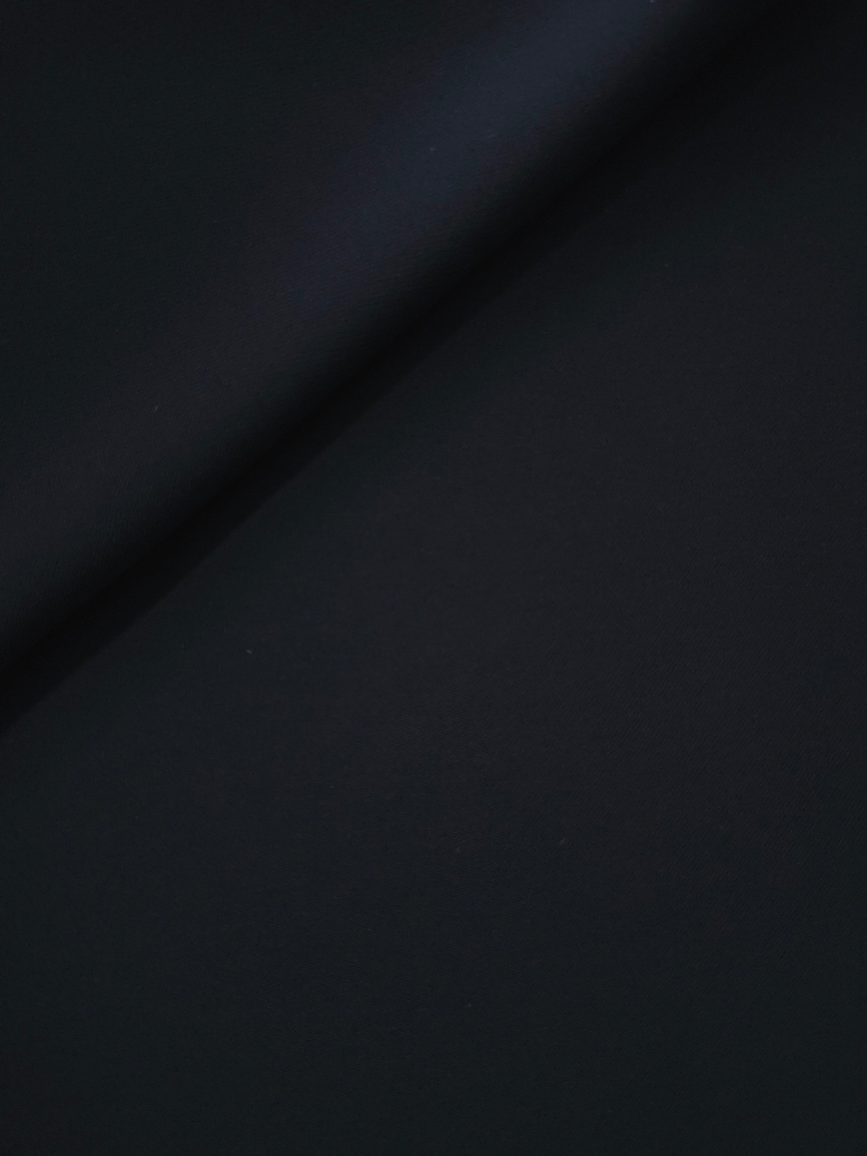 Blue Black polyester crepe gathered into a soft fold, showing fluid drape for dresses and blouse making