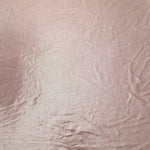 Flat view of Blush Champagne shimmer stretch fabric showing its metallic foil surface for costumes, partywear and fashion apparel