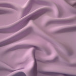 Fluid folds of Blush Mauve opaque Korean crepe, a dress fabric suited to eveningwear and flowing skirts