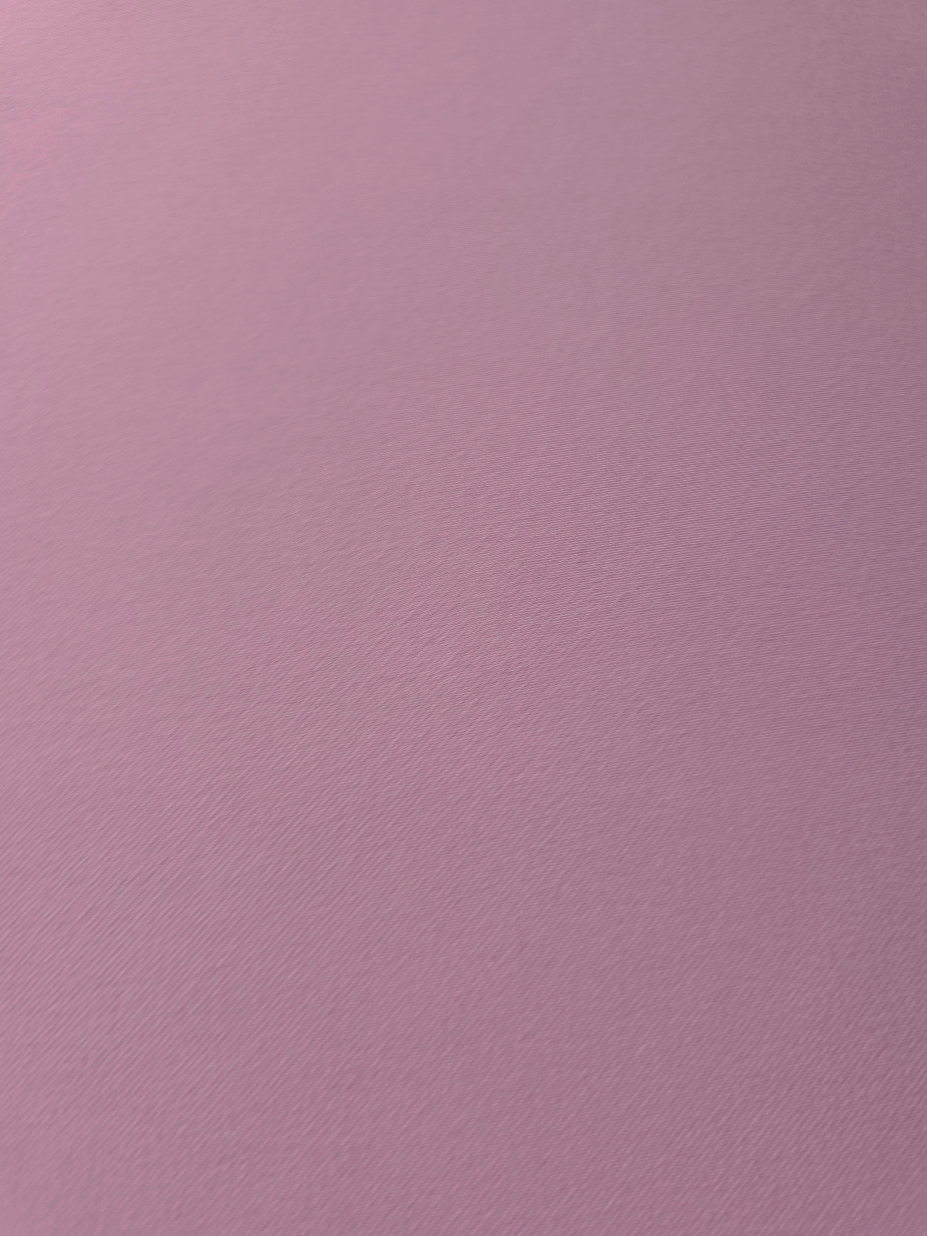 Texture detail of Blush Mauve mechanical polyester crepe, a smooth woven fabric with a soft silky hand