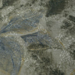 Blue botanical shadow linen-look jacquard fabric pattern overview with tonal woven leaf design.