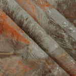 Reverse side of orange botanical shadow jacquard fabric showing woven structure and linen-look finish.