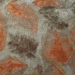 Texture view of orange botanical shadow linen-look jacquard fabric with raised tonal botanical motif.