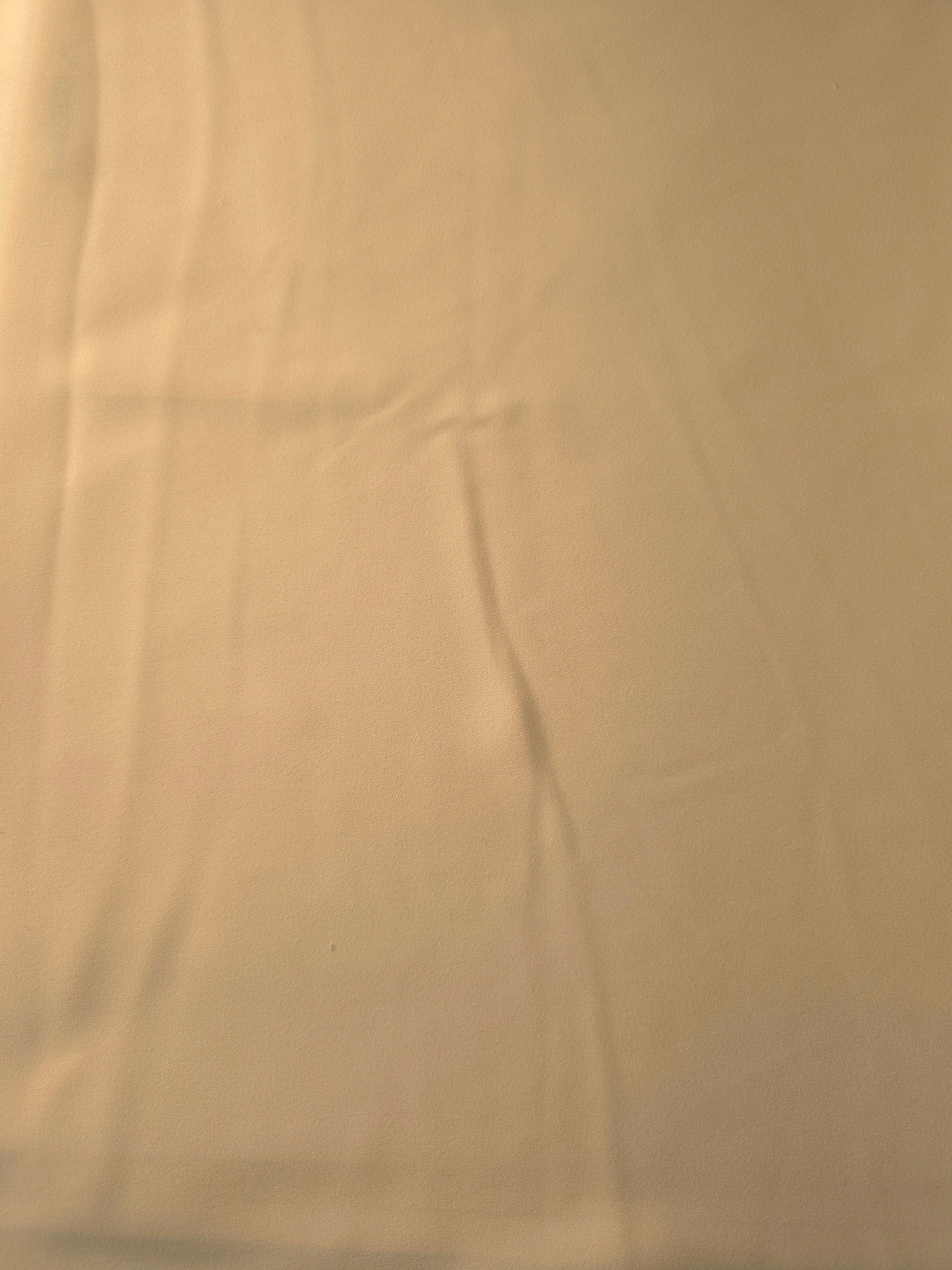 Flat view of Camel Beige Korean polyester crepe, 205 GSM opaque dressmaking fabric with a smooth woven surface