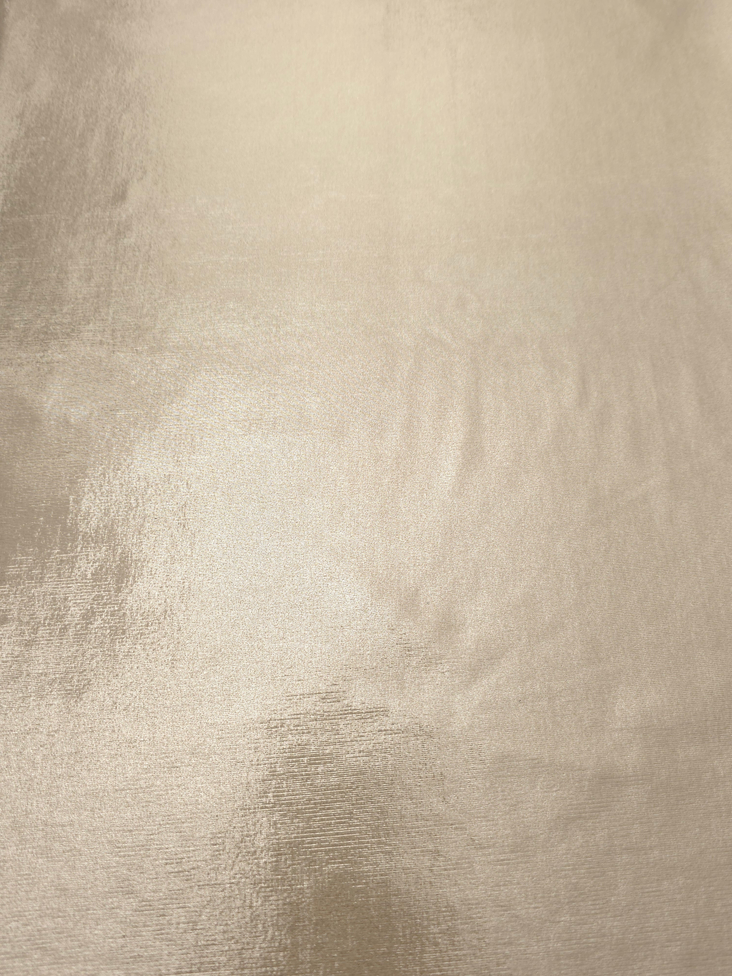 Champagne Beige shimmer metallic foiled spandex shown flat, displaying reflective finish for dance costumes, skirts and event apparel