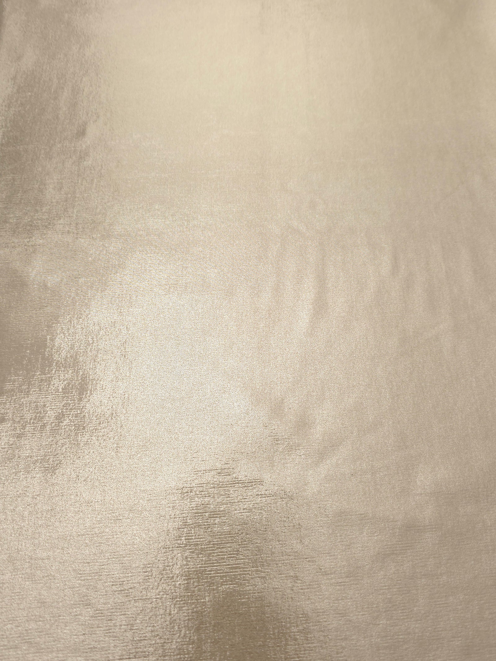 Champagne Beige shimmer metallic foiled spandex shown flat, displaying reflective finish for dance costumes, skirts and event apparel