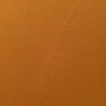 Fine texture close-up of Cinnamon Brown 100% mechanical polyester crepe showing a smooth, silky-soft woven hand