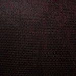Close-up of Burgundy Red Sheer Circle Shimmer Stretch Tulle Fabric revealing the circular shimmer repeat and fine sheer mesh