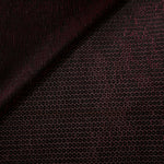 Front and back of Burgundy Red Sheer Circle Shimmer Stretch Tulle Fabric showing transparent knit structure, circle motif and stretch