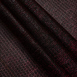Layered Burgundy Red Sheer Circle Shimmer Stretch Tulle Fabric showing overlapping circles, luminous depth and airy transparency