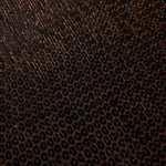 Close-up of Burnt Copper Sheer Circle Shimmer Stretch Tulle Fabric revealing the circular shimmer repeat and fine sheer mesh