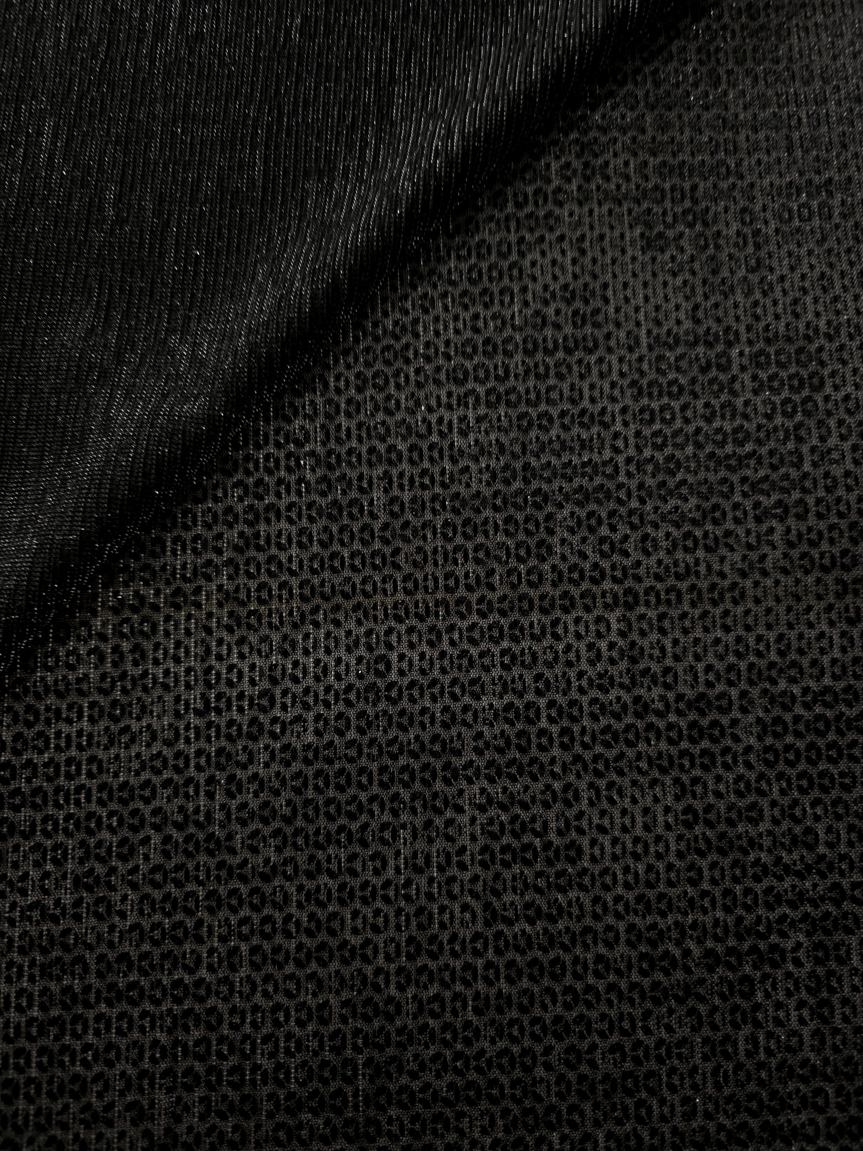 Front and back of Charcoal Silver Sheer Circle Shimmer Stretch Tulle Fabric showing transparent knit structure, circle motif and stretch
