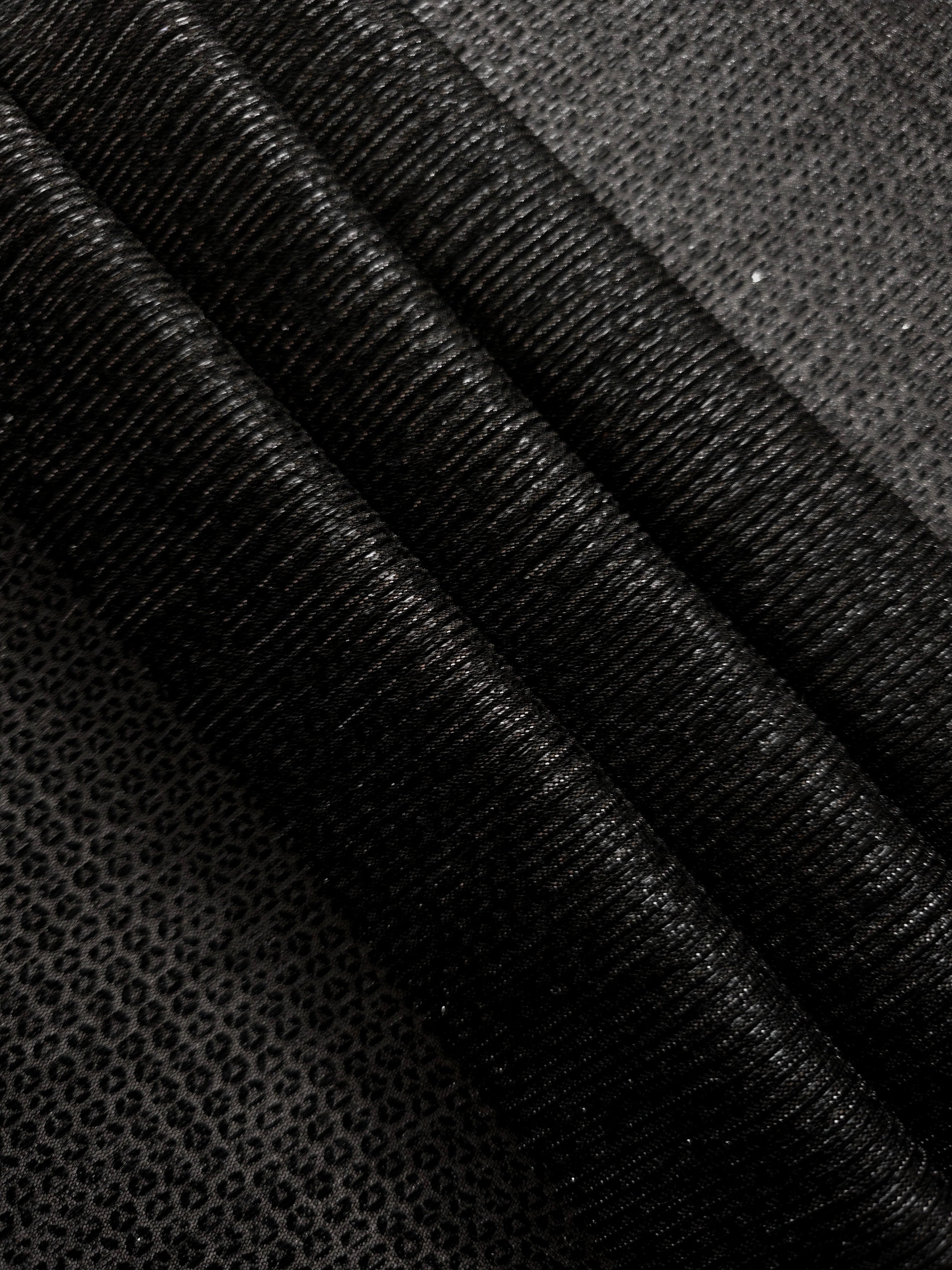 Layered Charcoal Silver Sheer Circle Shimmer Stretch Tulle Fabric showing overlapping circles, luminous depth and airy transparency