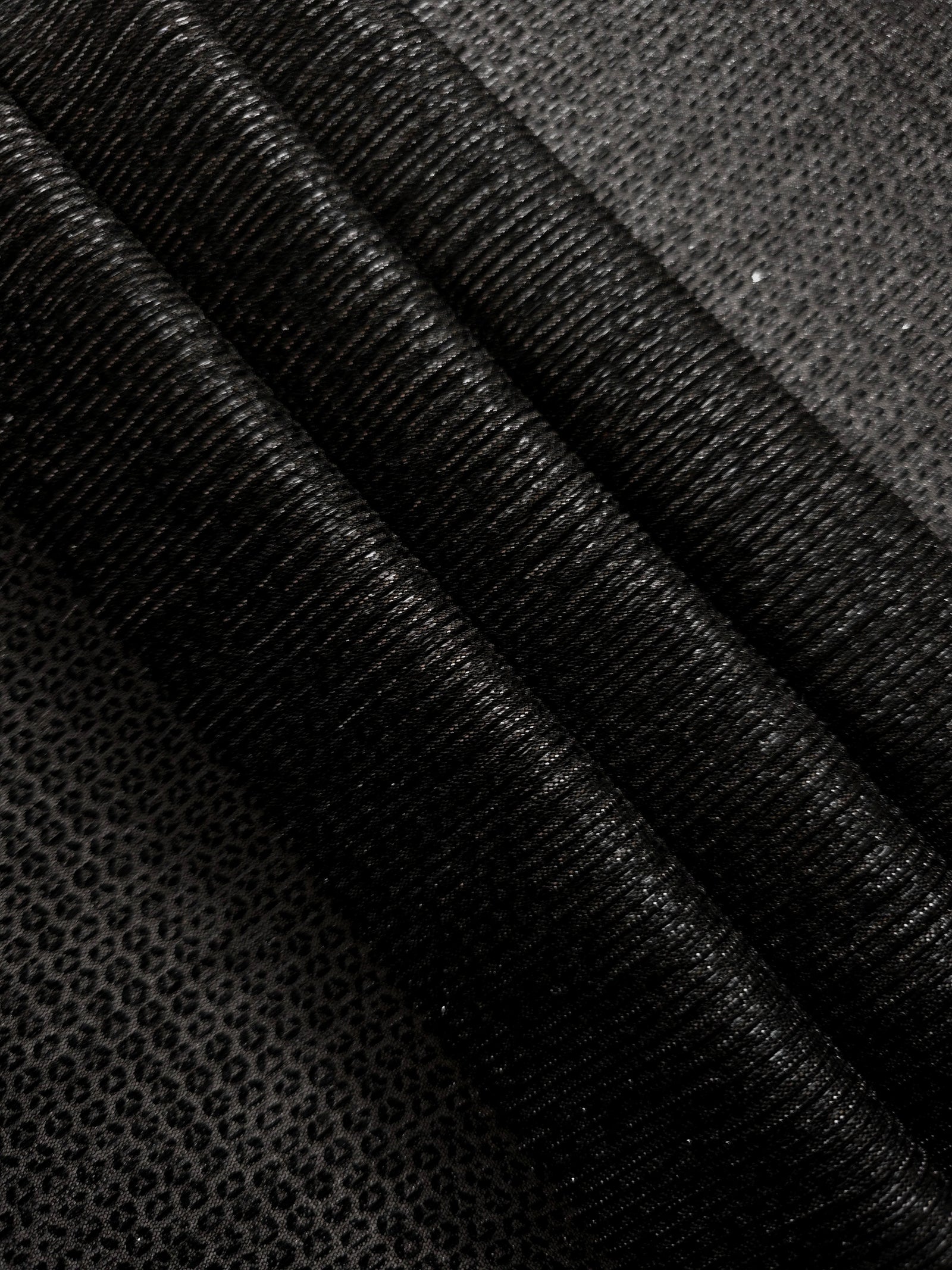 Layered Charcoal Silver Sheer Circle Shimmer Stretch Tulle Fabric showing overlapping circles, luminous depth and airy transparency