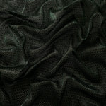 Draped Deep Emerald Sheer Circle Shimmer Stretch Tulle Fabric showing reflective round motifs across soft fluid folds