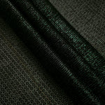 Layered Deep Emerald Sheer Circle Shimmer Stretch Tulle Fabric showing overlapping circles, luminous depth and airy transparency