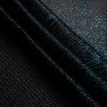 Swirl-draped Deep Teal Sheer Circle Shimmer Stretch Tulle Fabric showing circular highlights shifting through flexible movement