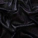 Front and back of Midnight Indigo Sheer Circle Shimmer Stretch Tulle Fabric showing transparent knit structure, circle motif and stretch