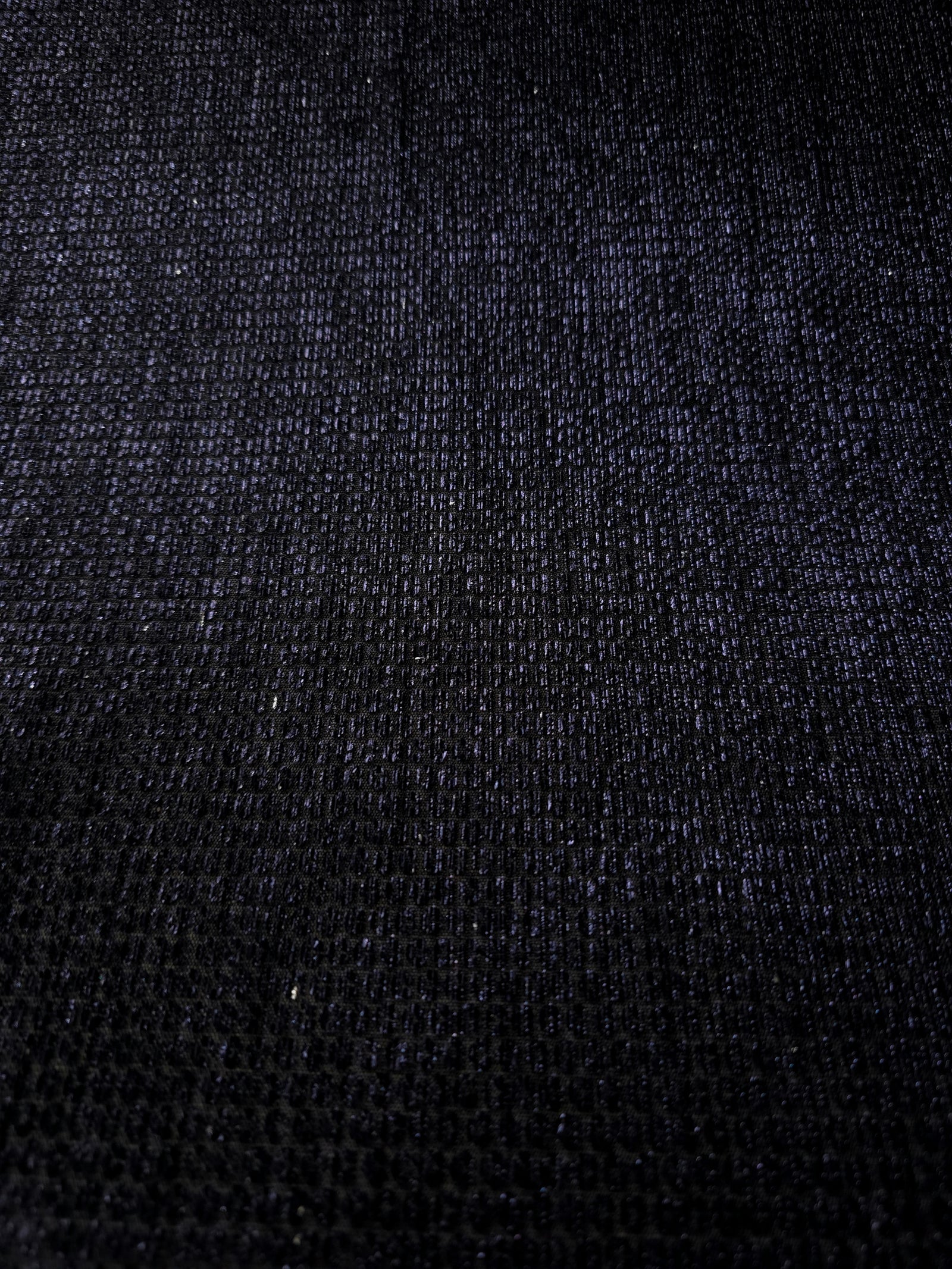 Layered Midnight Indigo Sheer Circle Shimmer Stretch Tulle Fabric showing overlapping circles, luminous depth and airy transparency