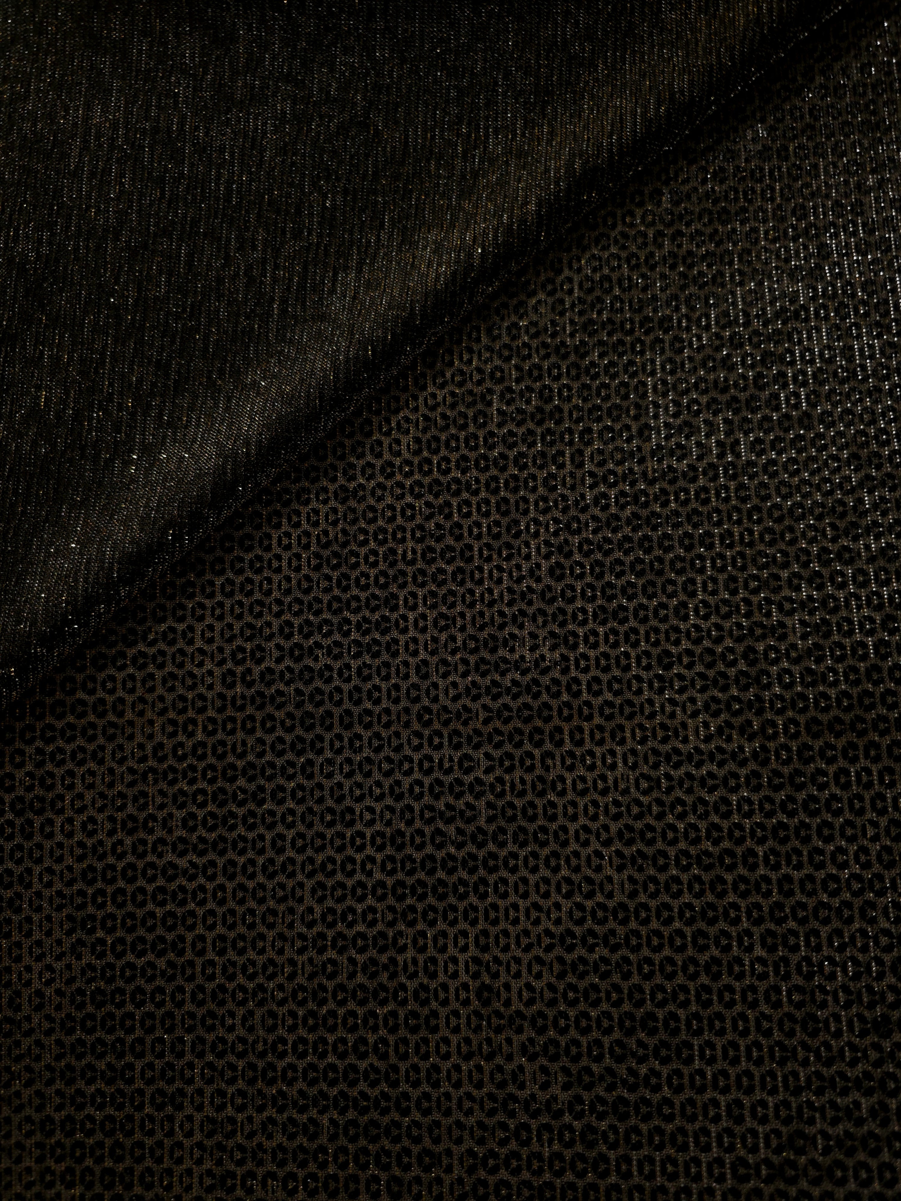 Front and back of Olive Gold Sheer Circle Shimmer Stretch Tulle Fabric showing transparent knit structure, circle motif and stretch