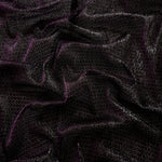 Draped Plum Violet Sheer Circle Shimmer Stretch Tulle Fabric showing reflective round motifs across soft fluid folds