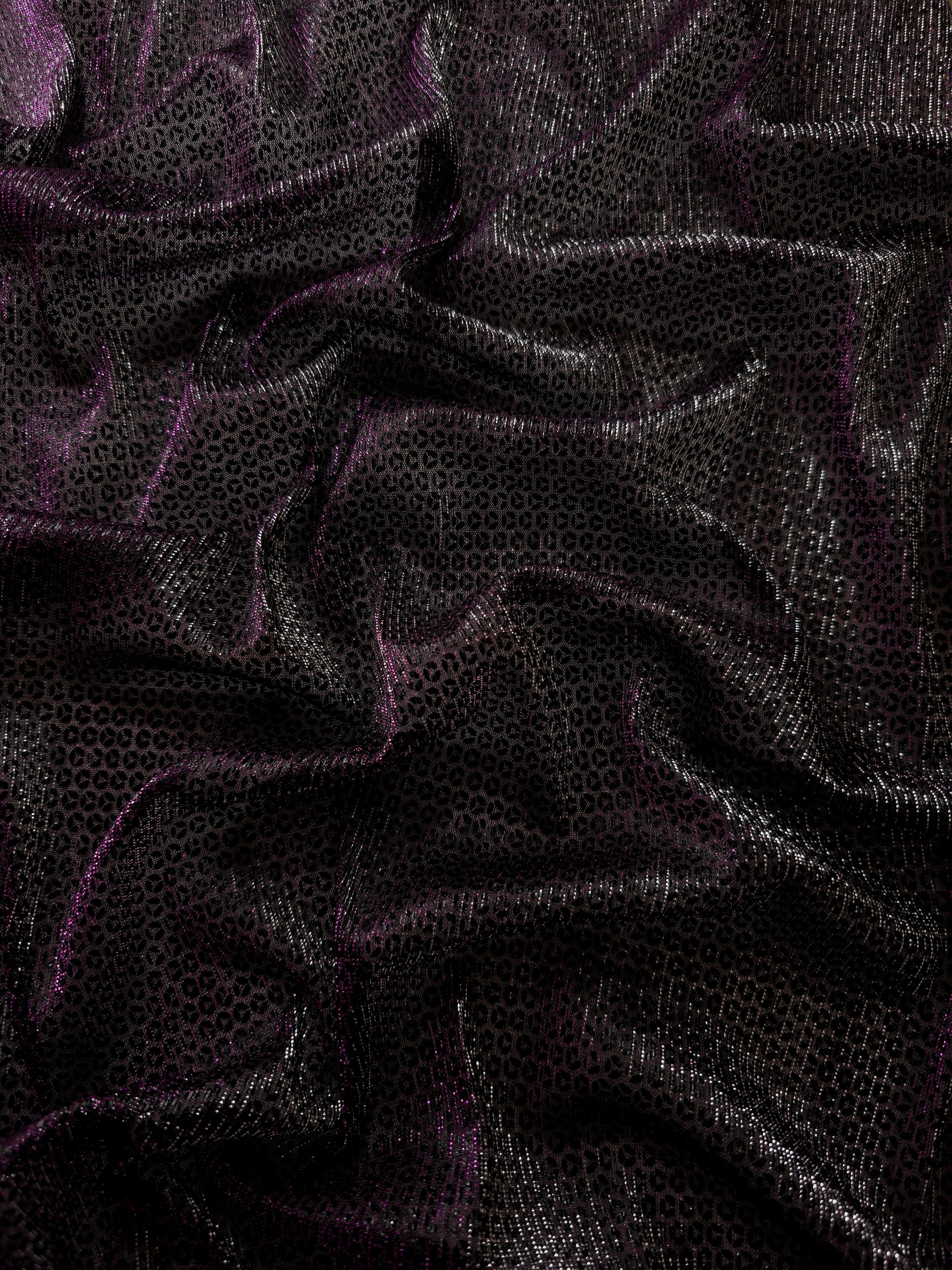 Draped Plum Violet Sheer Circle Shimmer Stretch Tulle Fabric showing reflective round motifs across soft fluid folds