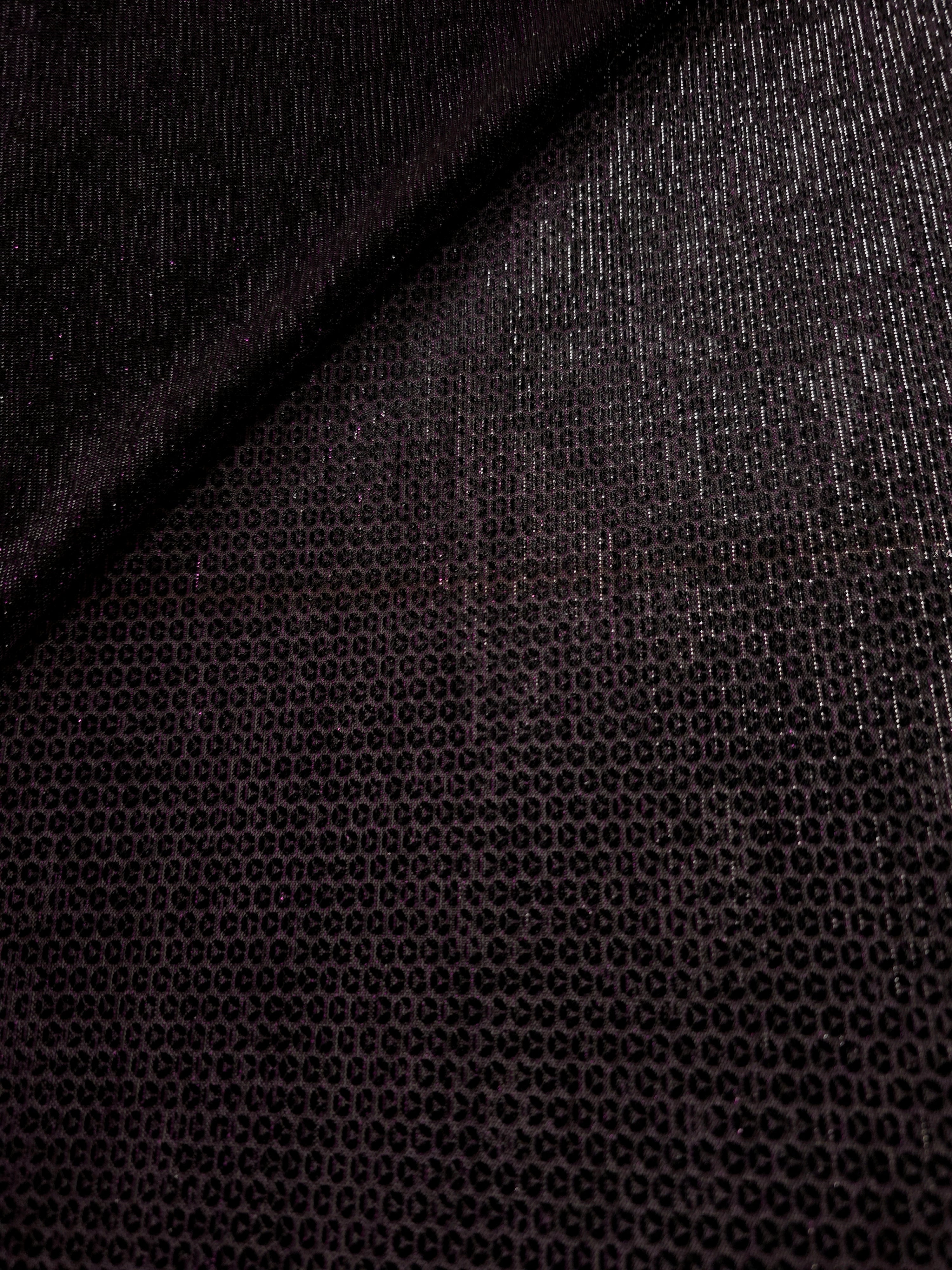 Front and back of Plum Violet Sheer Circle Shimmer Stretch Tulle Fabric showing transparent knit structure, circle motif and stretch