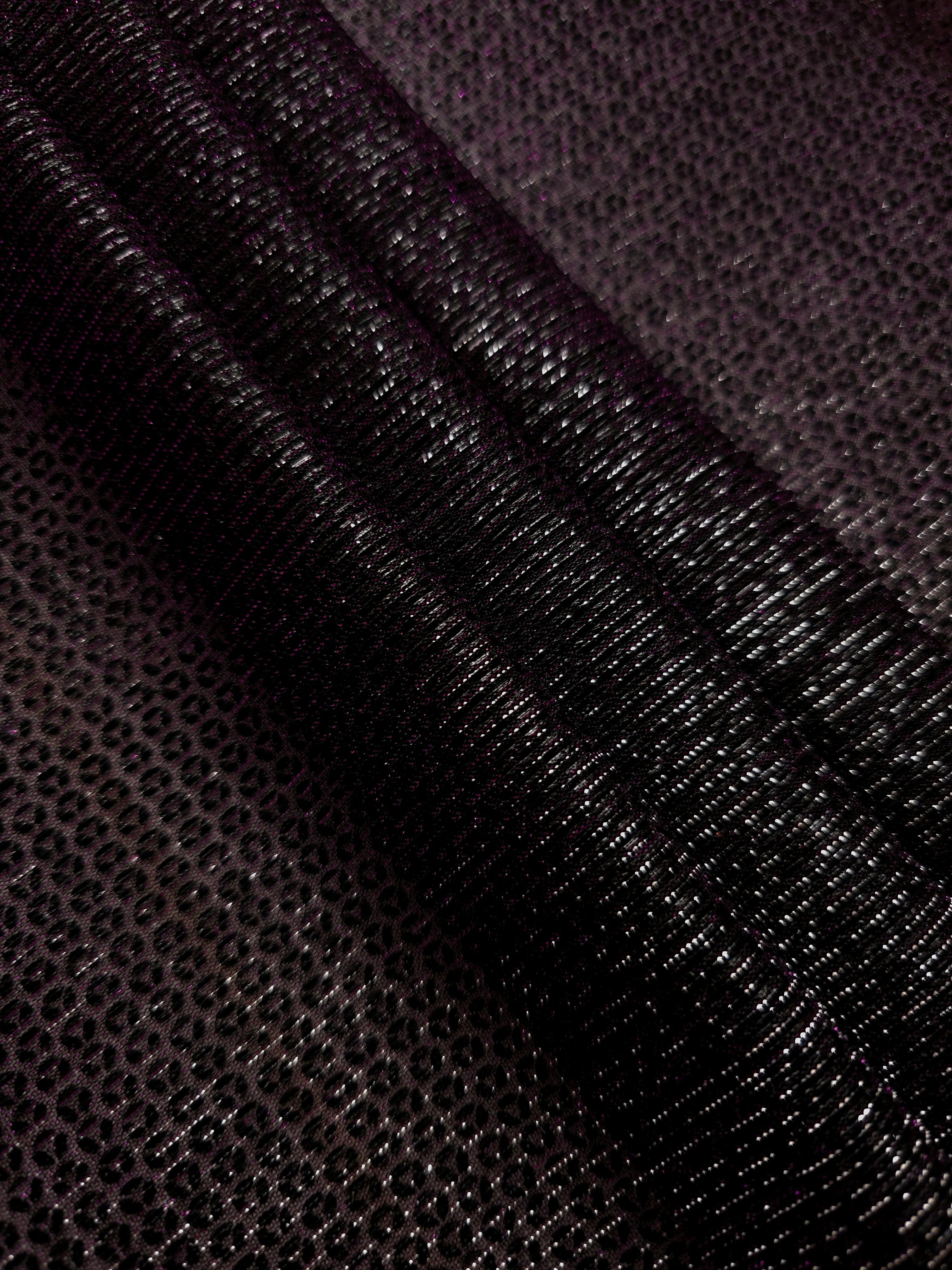 Layered Plum Violet Sheer Circle Shimmer Stretch Tulle Fabric showing overlapping circles, luminous depth and airy transparency