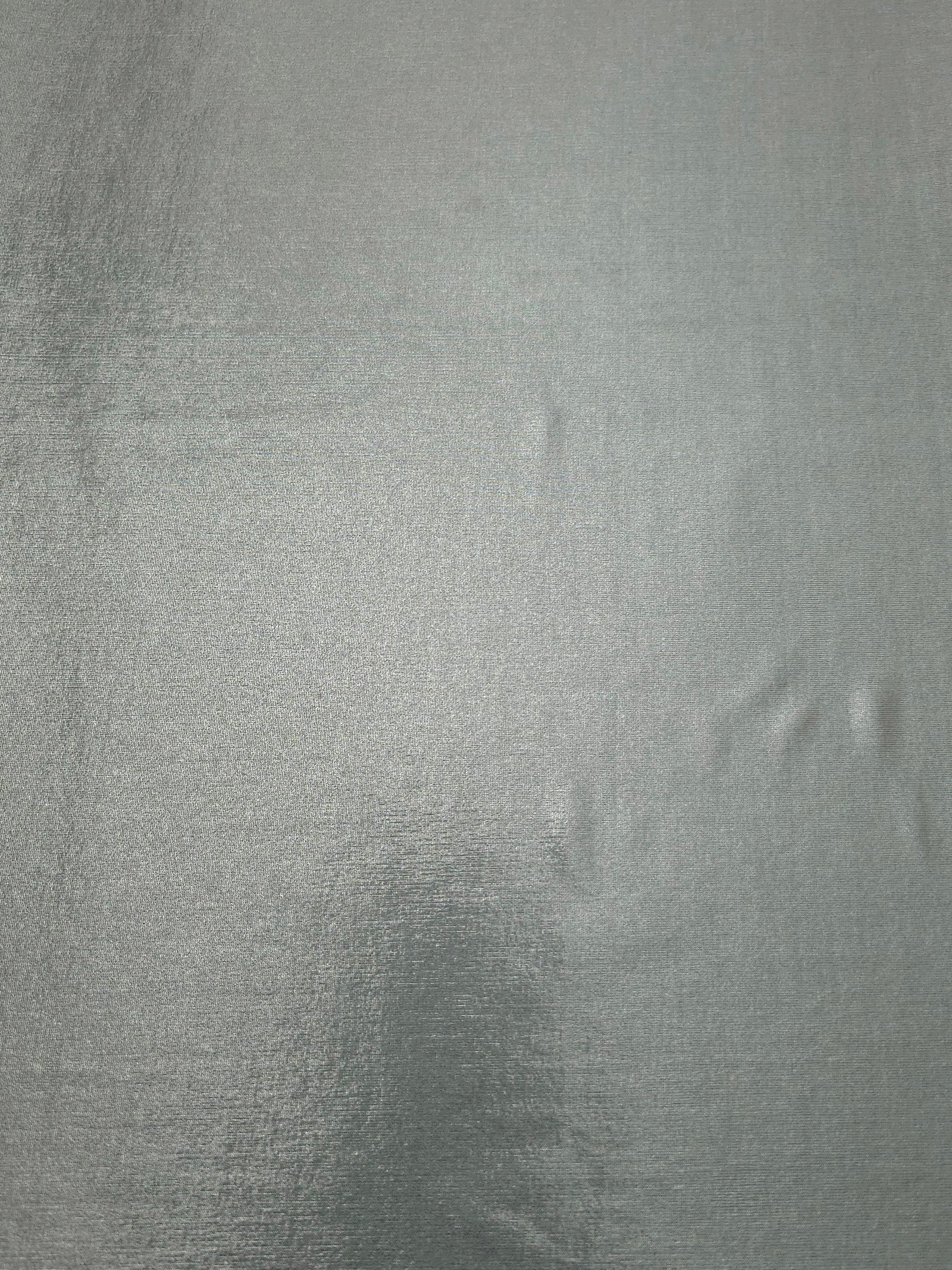 Cool Silver Gray shimmer metallic foiled spandex shown flat, displaying reflective finish for dance costumes, skirts and event apparel