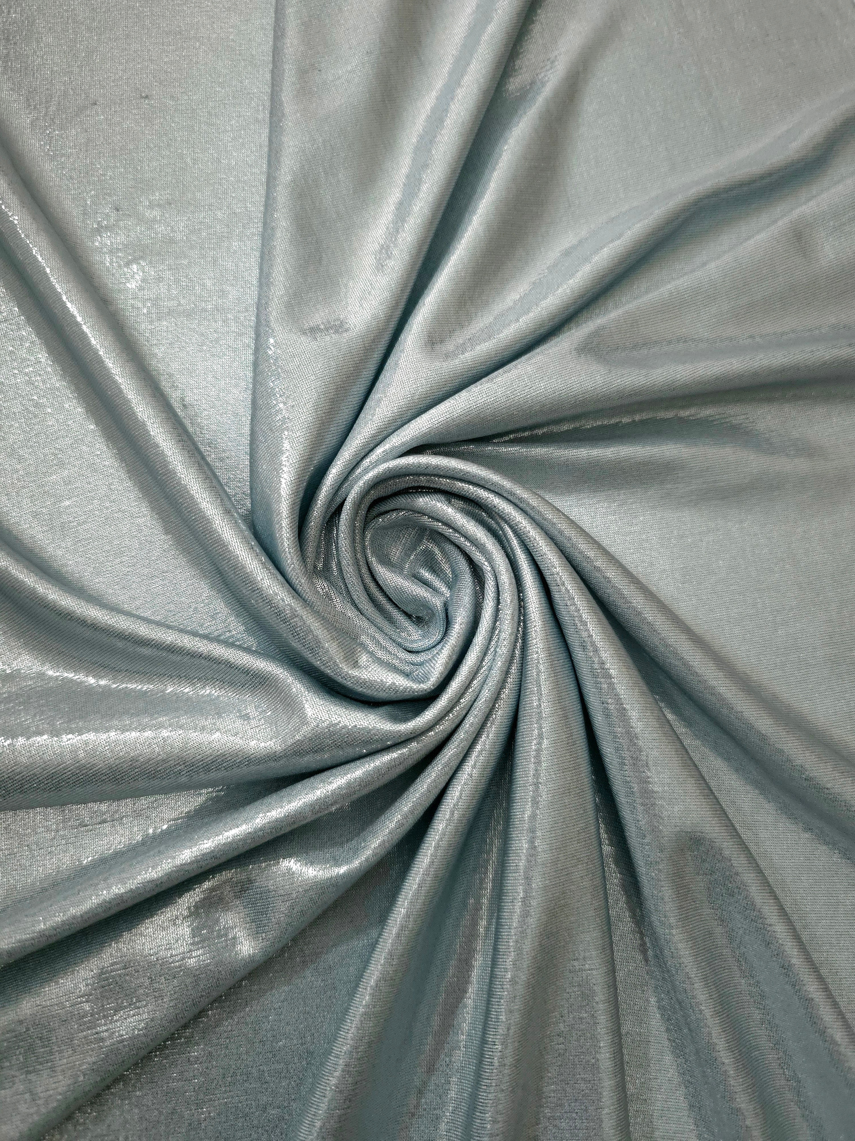 Cool Silver Gray foiled spandex styled in a swirl, revealing metallic shine and flexible drape for dance costumes and occasion looks