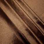 Layered Copper Brown shimmer stretch fabric showing metallic foil depth and soft structure for costumes, skirts and fashion apparel