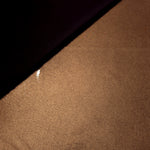 Copper Brown shimmer spandex in a soft fold, showing metallic foil sheen and flexible drape for tops, skirts and costumes