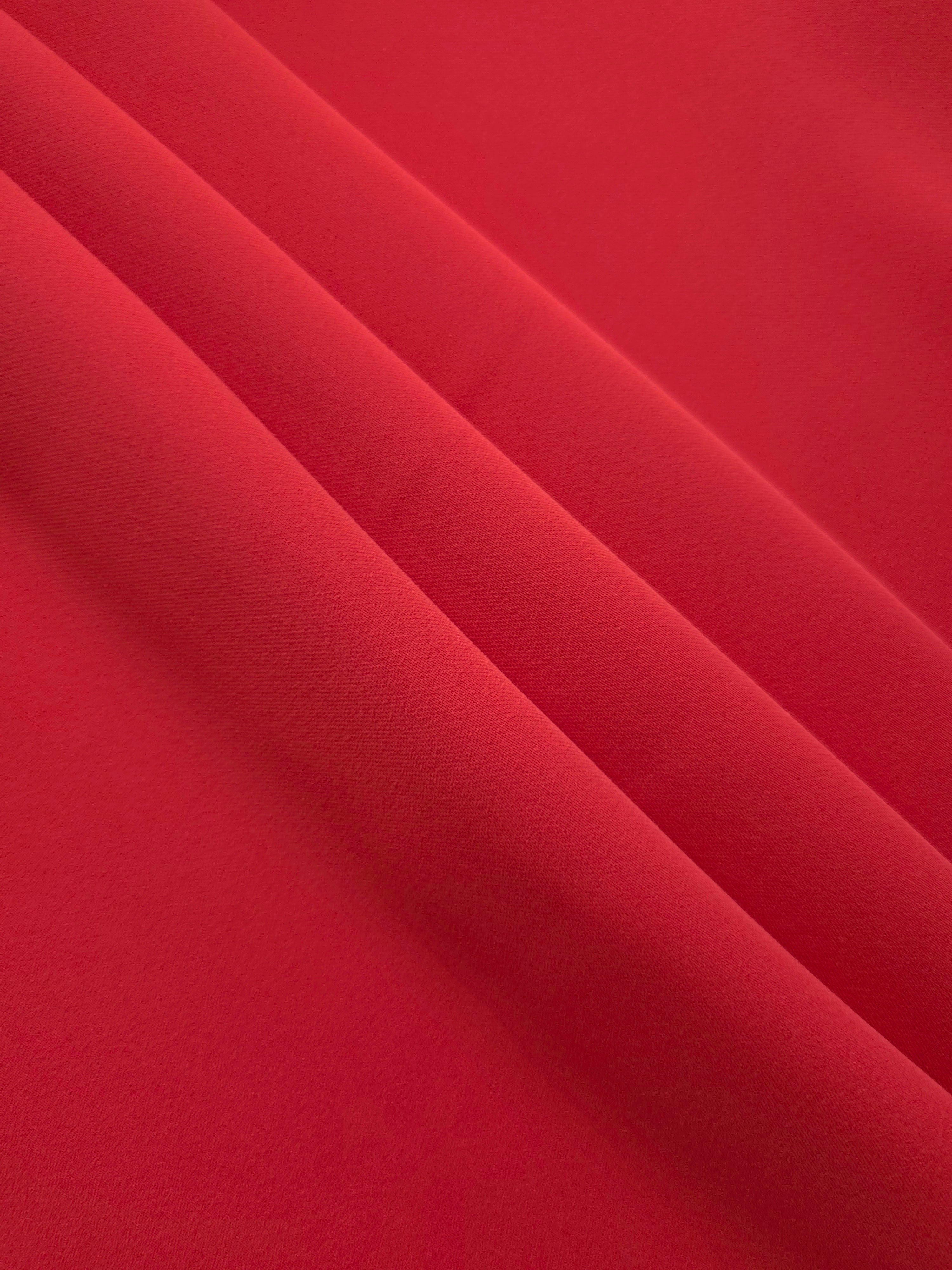 Crimson Red mechanical polyester crepe layered to show soft structure for tailored garments and separates