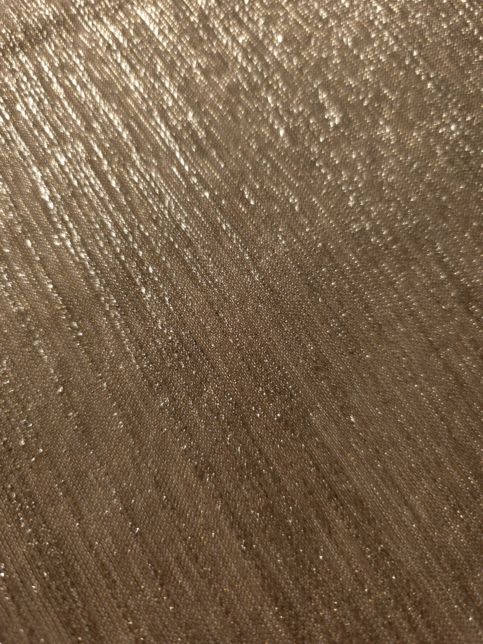 Close-up of Antique Taupe Gold Sheer Metallic Shimmer Stretch Tulle Fabric highlighting fine sheer mesh texture, metallic shimmer, lightweight stretch and subtle transparency for fashion and performance wear