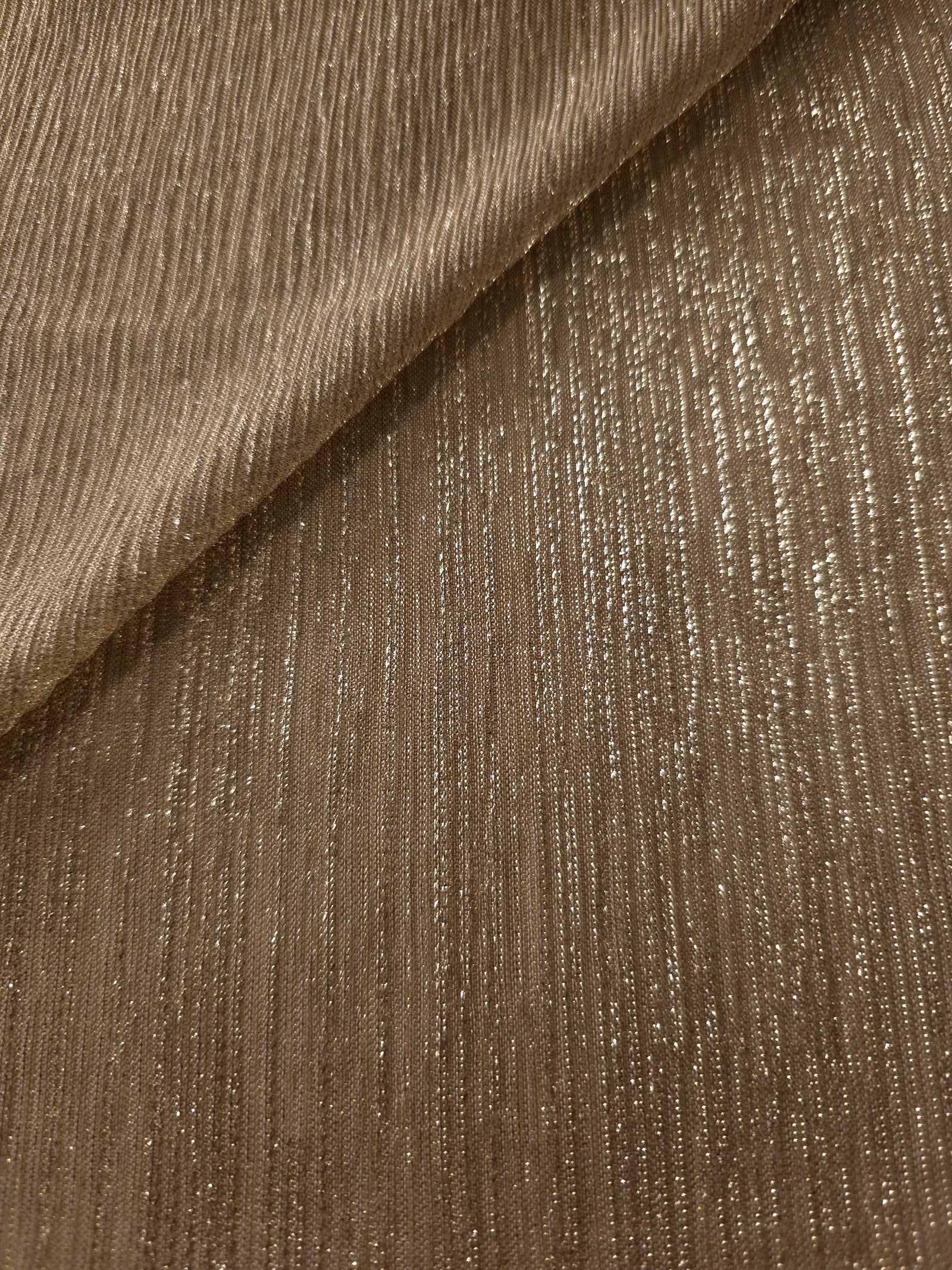 Antique Taupe Gold Sheer Metallic Shimmer Stretch Tulle Fabric shown front and back, revealing reflective metallic shimmer, translucent mesh structure and flexible stretch for layered garments, costumes and dancewear